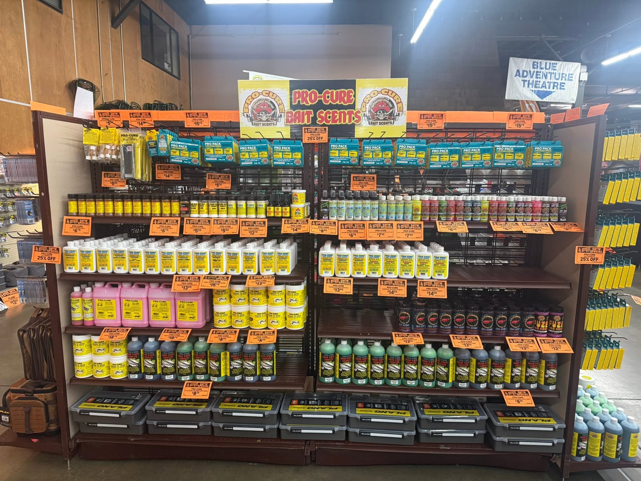 Full Pro-Cure shelf wall at a big-box outdoor retailer
