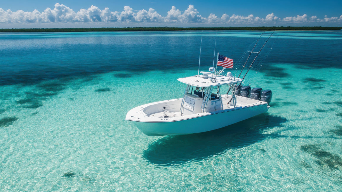 Center console boat anchored over clear flats inshore